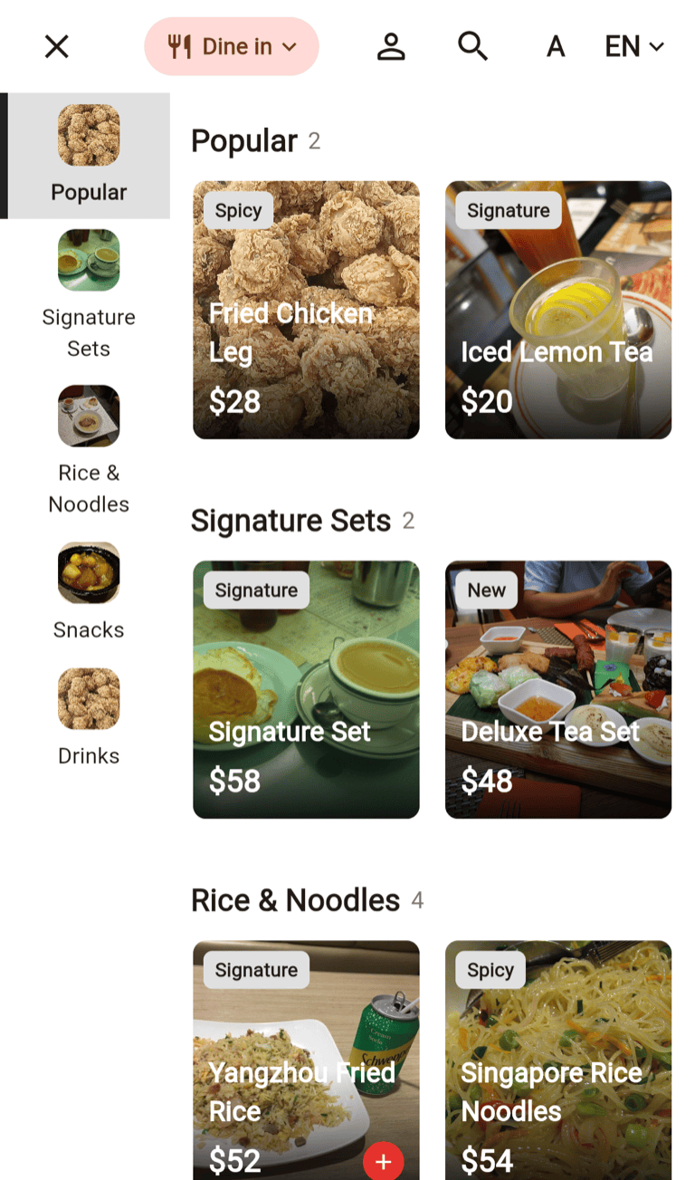 Real DoLA kiosk menu screen in English — photo dish cards, categories and cart
